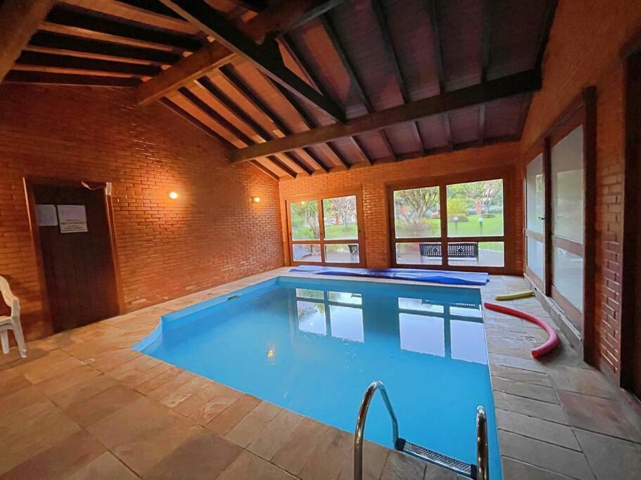 Aconchegante Apto 3 Dorm. Com Piscina Aquecida กรามาโด ภายนอก รูปภาพ